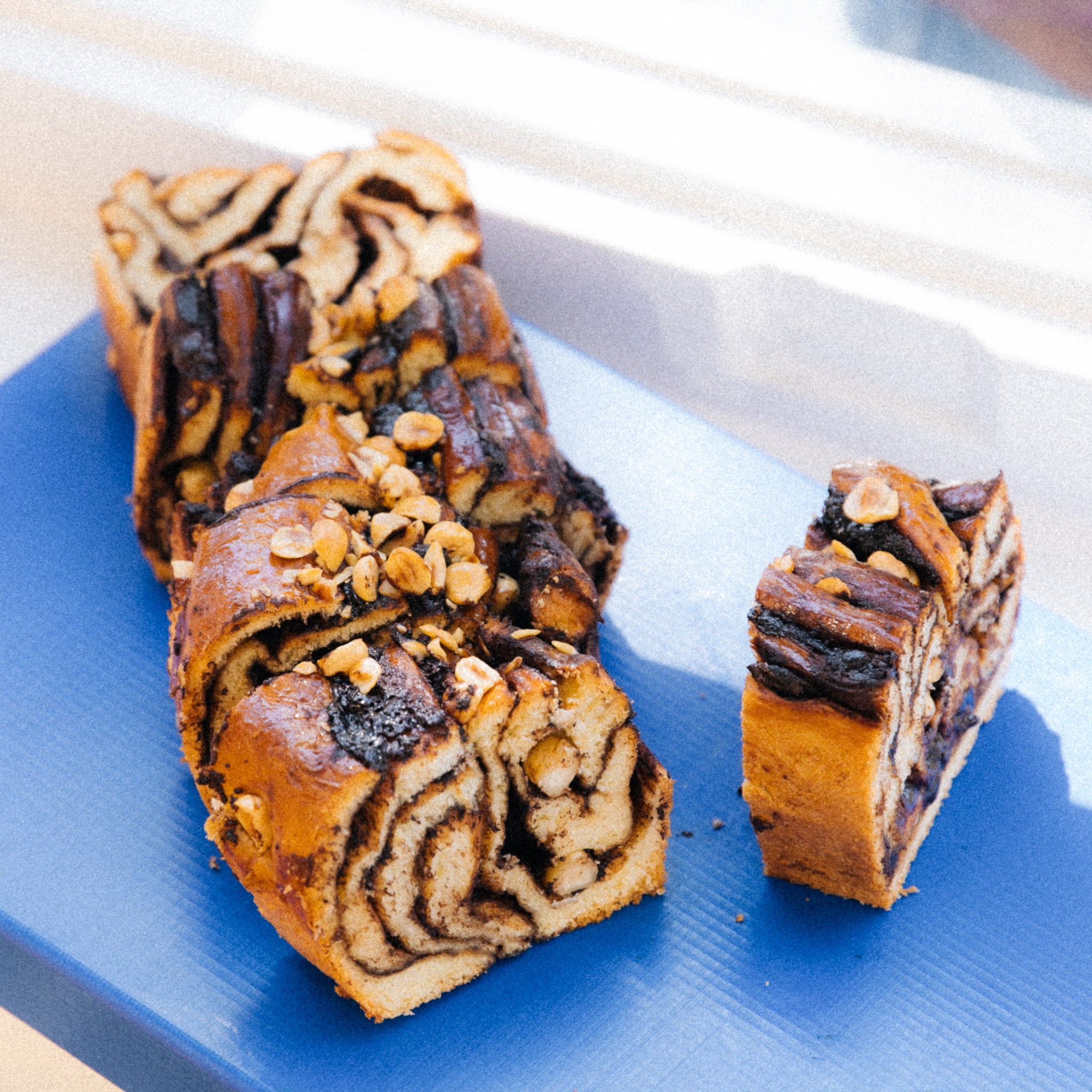 Brioche filled with dark chocolate and hazelnuts. Our babka has a rich, soft dough, sweetened with organic coconut palm sugar and a luscious caramelized crust.   100% plant-based & vegan-friendly | Allergens: Gluten & nuts.