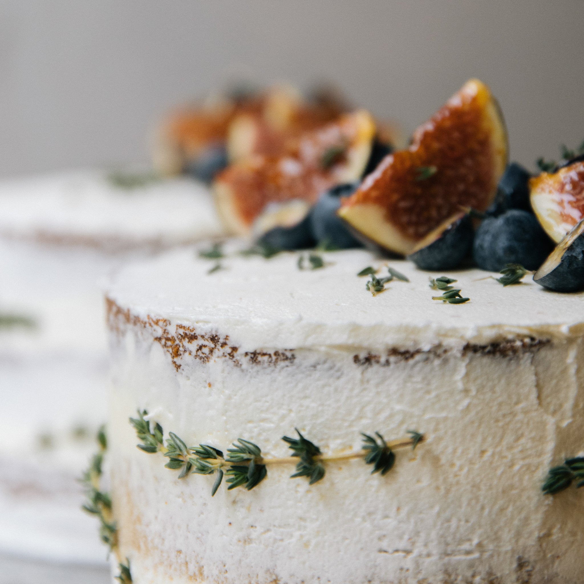 Naked cake constructed with 3 layers of vanilla cake with lemon & yuzu custard scented with thyme leaves, finished with a light yusu sugar frosting and toped with fresh seasonal fruits. 